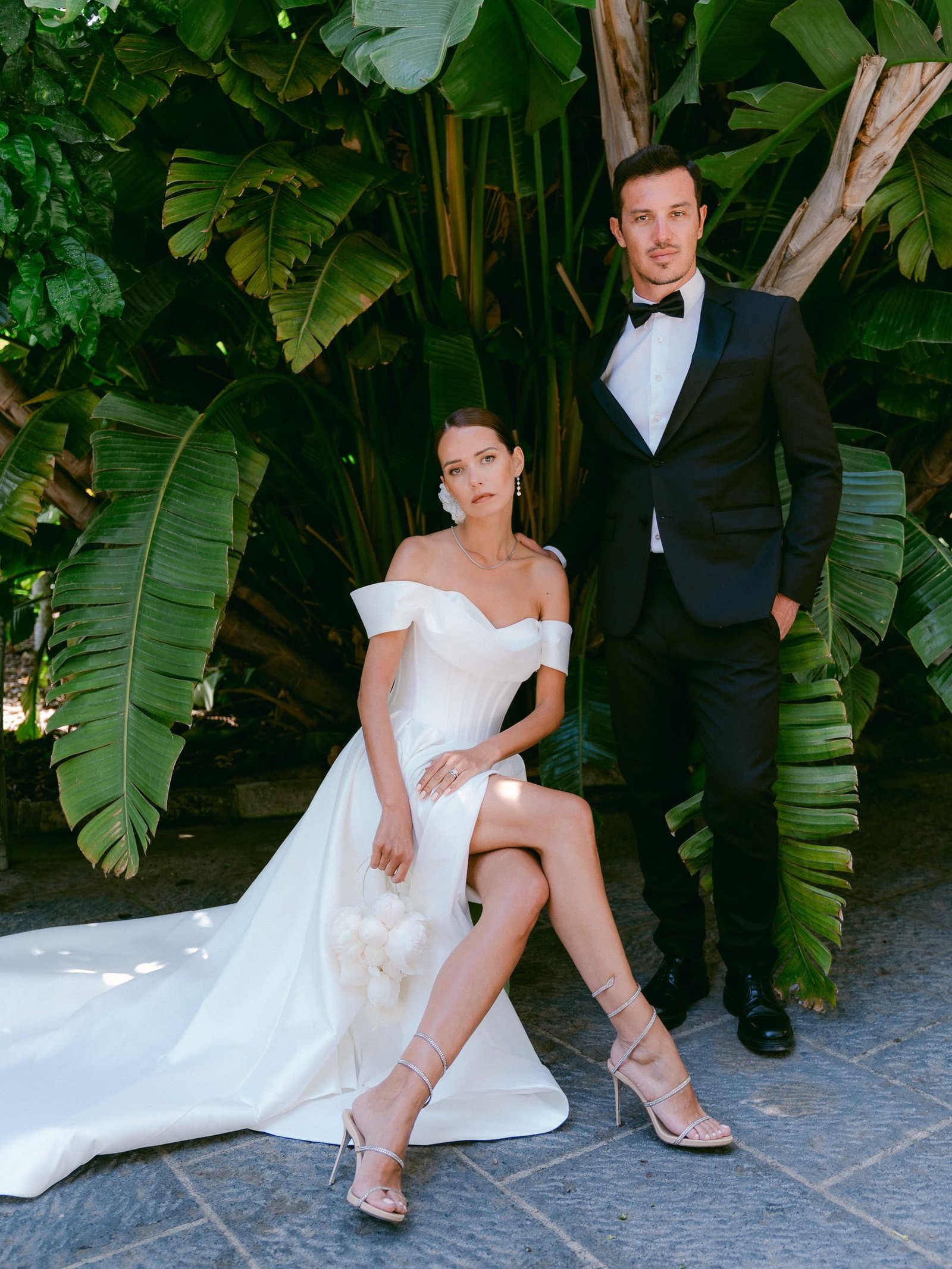 The couple beneath tropical foliage, Villa Zagara, Sorrento