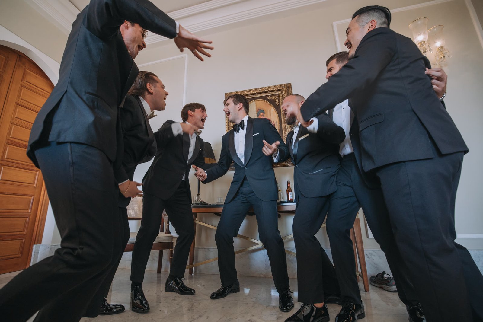 Ben and his groomsmen dancing before the ceremony