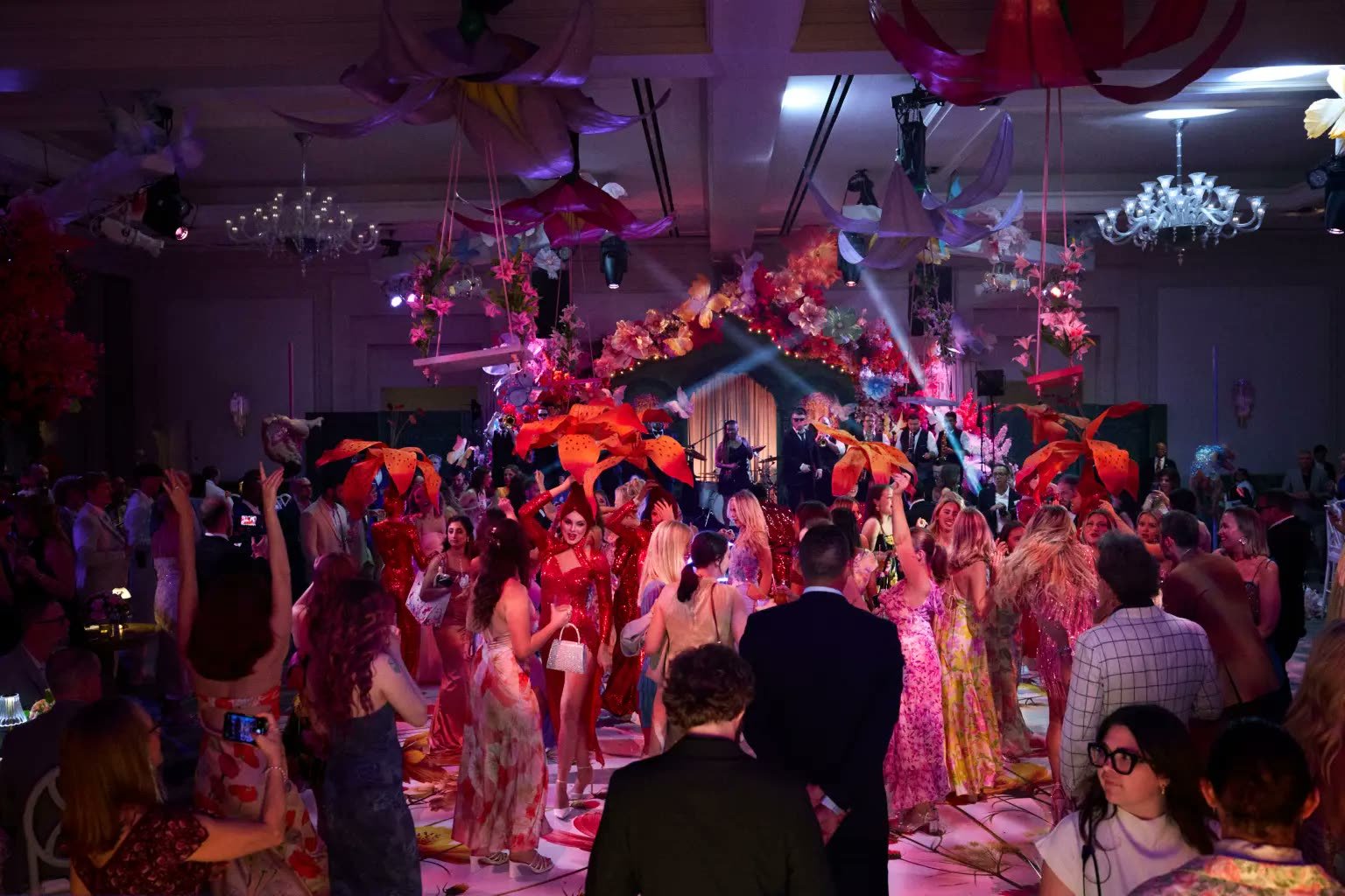 The floral-canopied stage and dance floor moments before The Chainsmokers' surprise performance